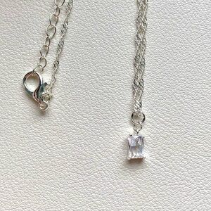 Elegant Silver Necklace with Clear Pendant